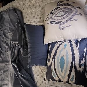 3 blue accent pillows